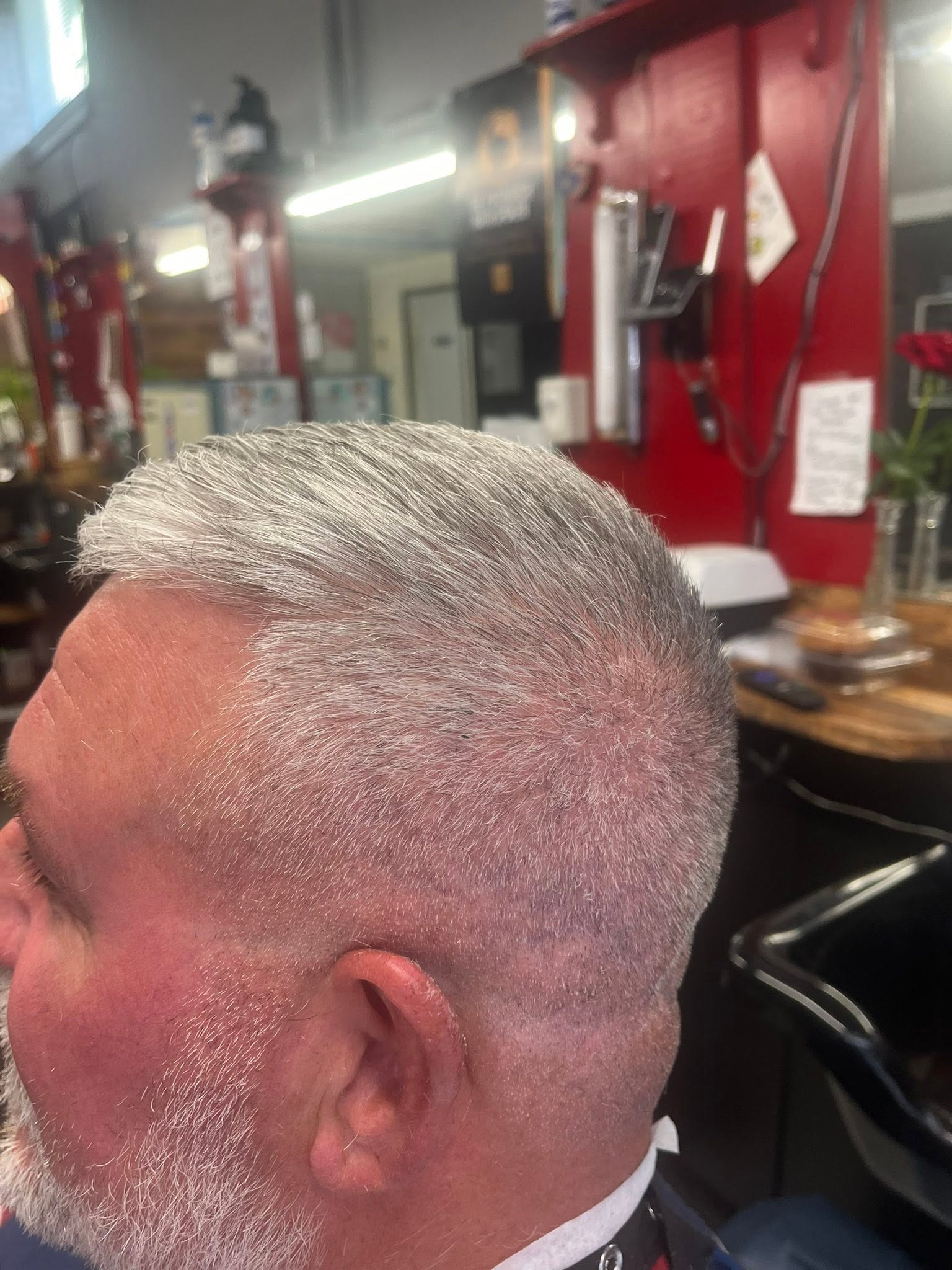 Fade haircut and hot towel shave by Downtown Barber Shop